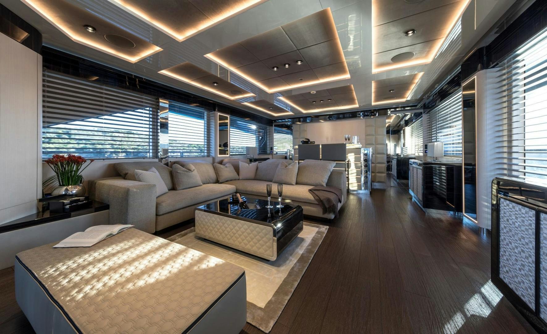 a living room with a large window aboard KALLIENTE Yacht for Sale