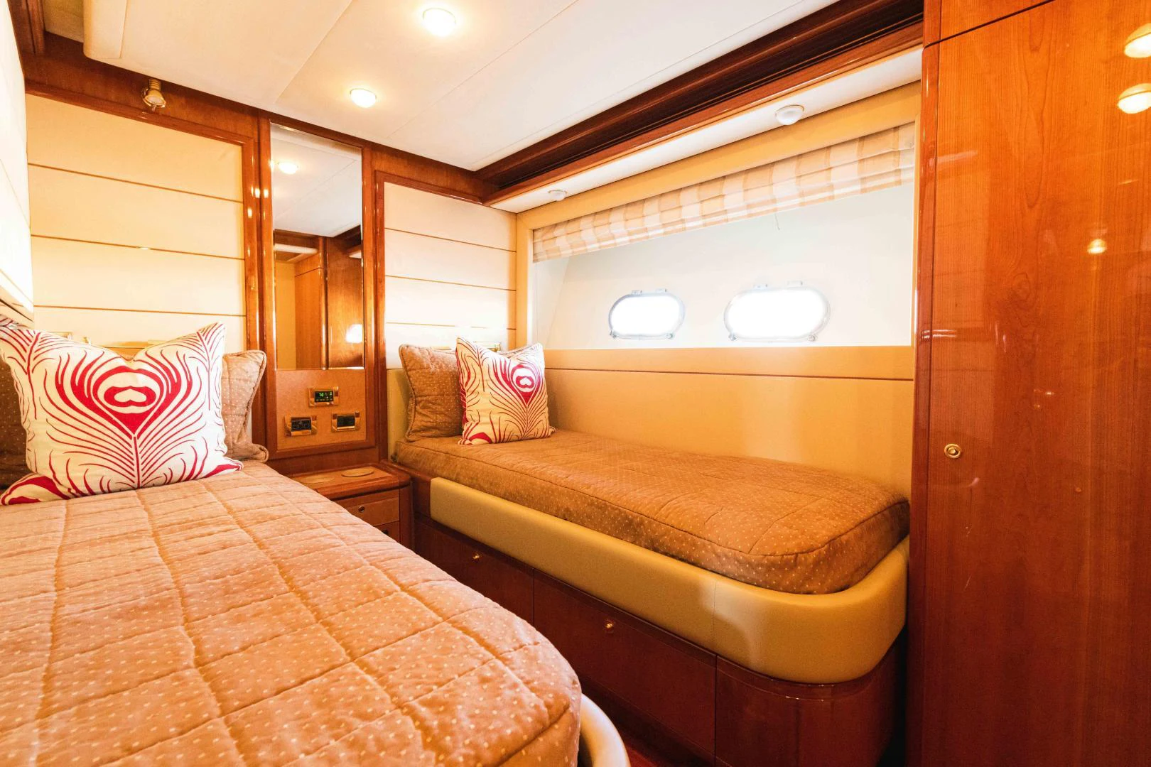 a couple of beds in a room aboard KAVITA Yacht for Sale