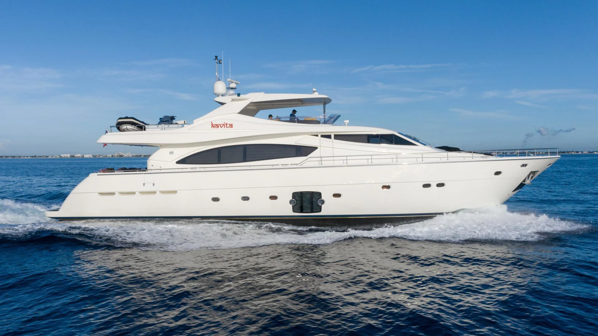 a white yacht on the water aboard KAVITA Yacht for Sale