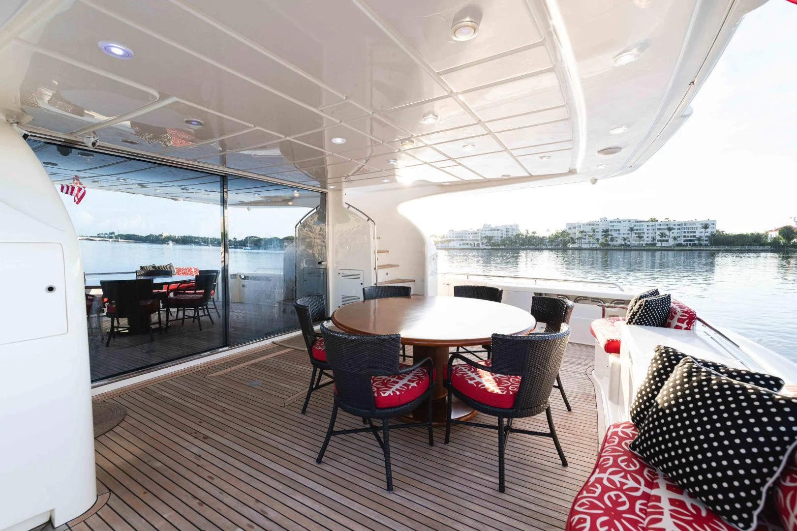a room with a table and chairs aboard KAVITA Yacht for Sale