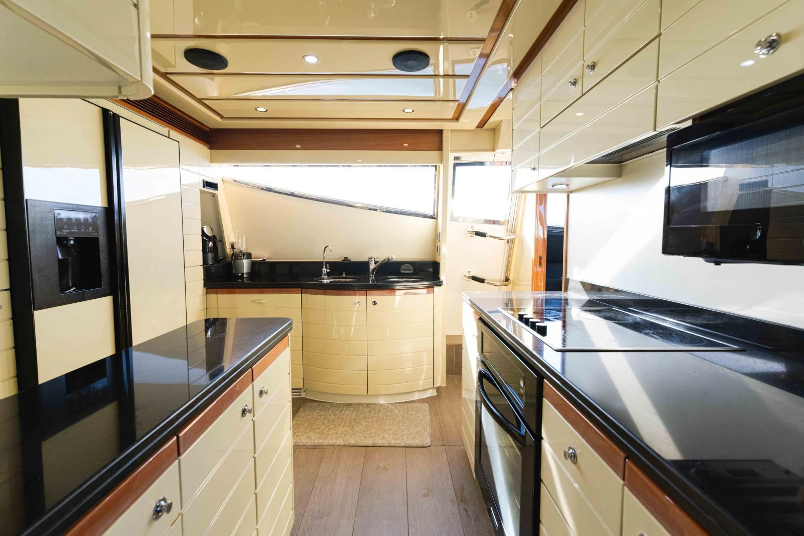 a kitchen with a stove and oven aboard KAVITA Yacht for Sale