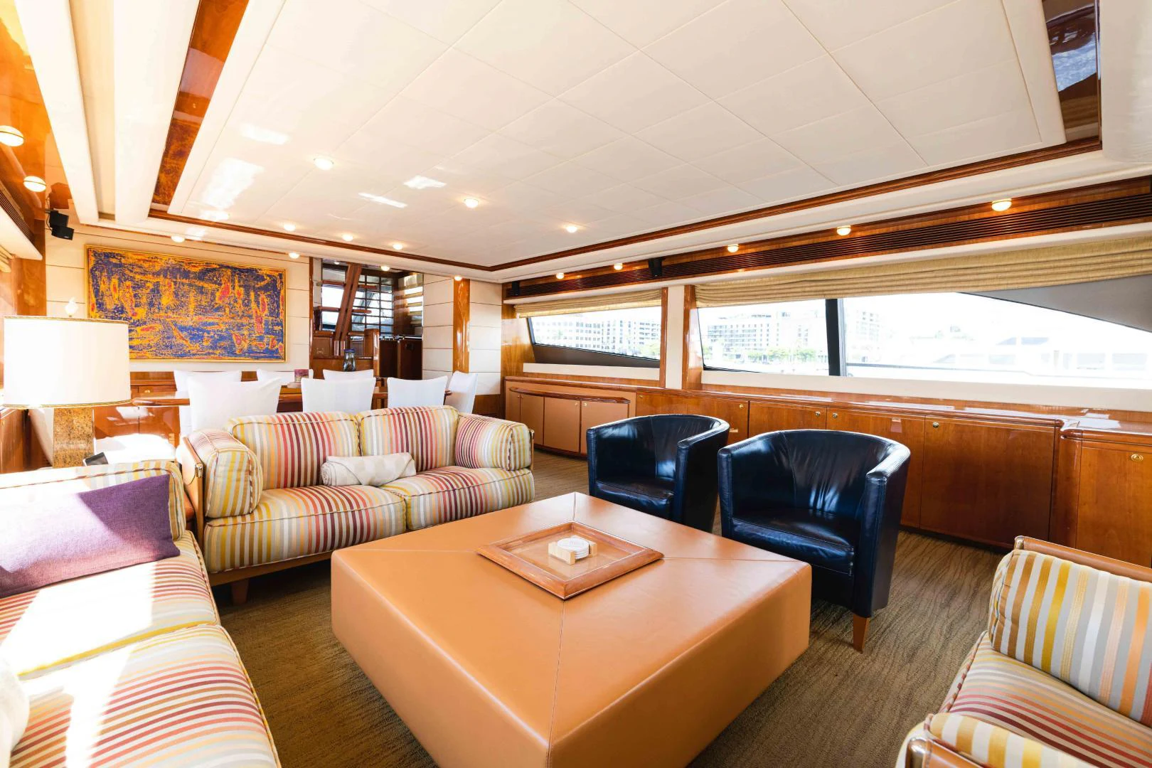 a living room with a couch and a table aboard KAVITA Yacht for Sale