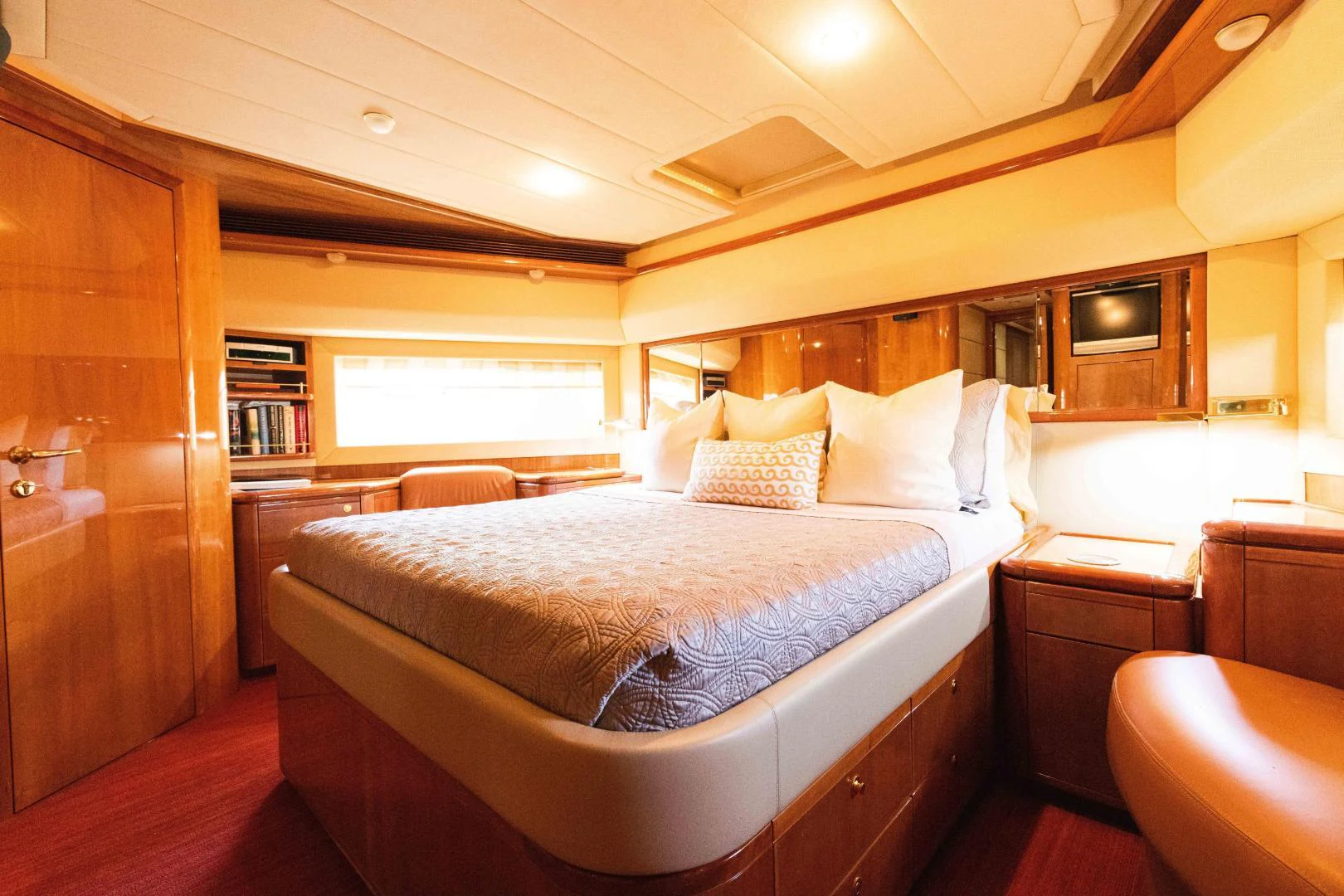 a room with a bed and a desk aboard KAVITA Yacht for Sale