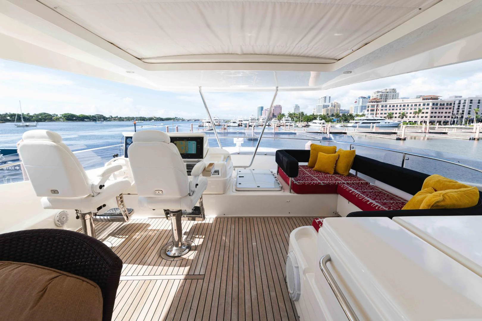 a boat with a deck and chairs aboard KAVITA Yacht for Sale