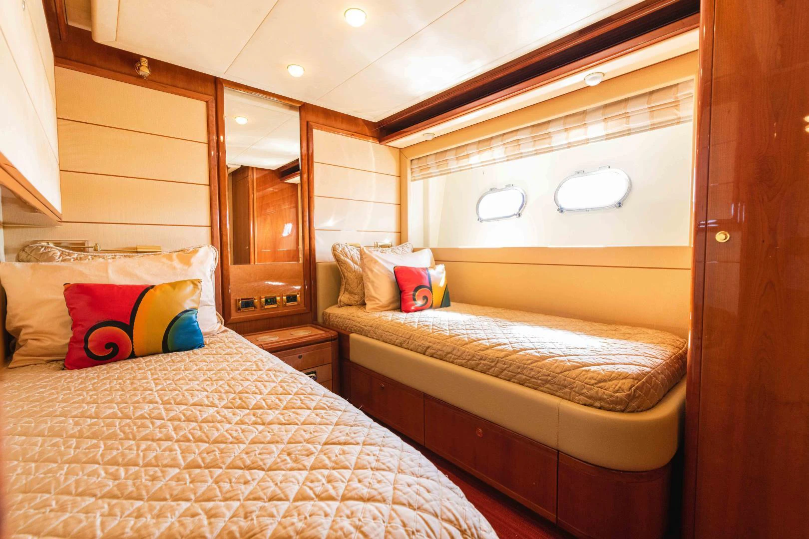 a bedroom with two beds aboard KAVITA Yacht for Sale