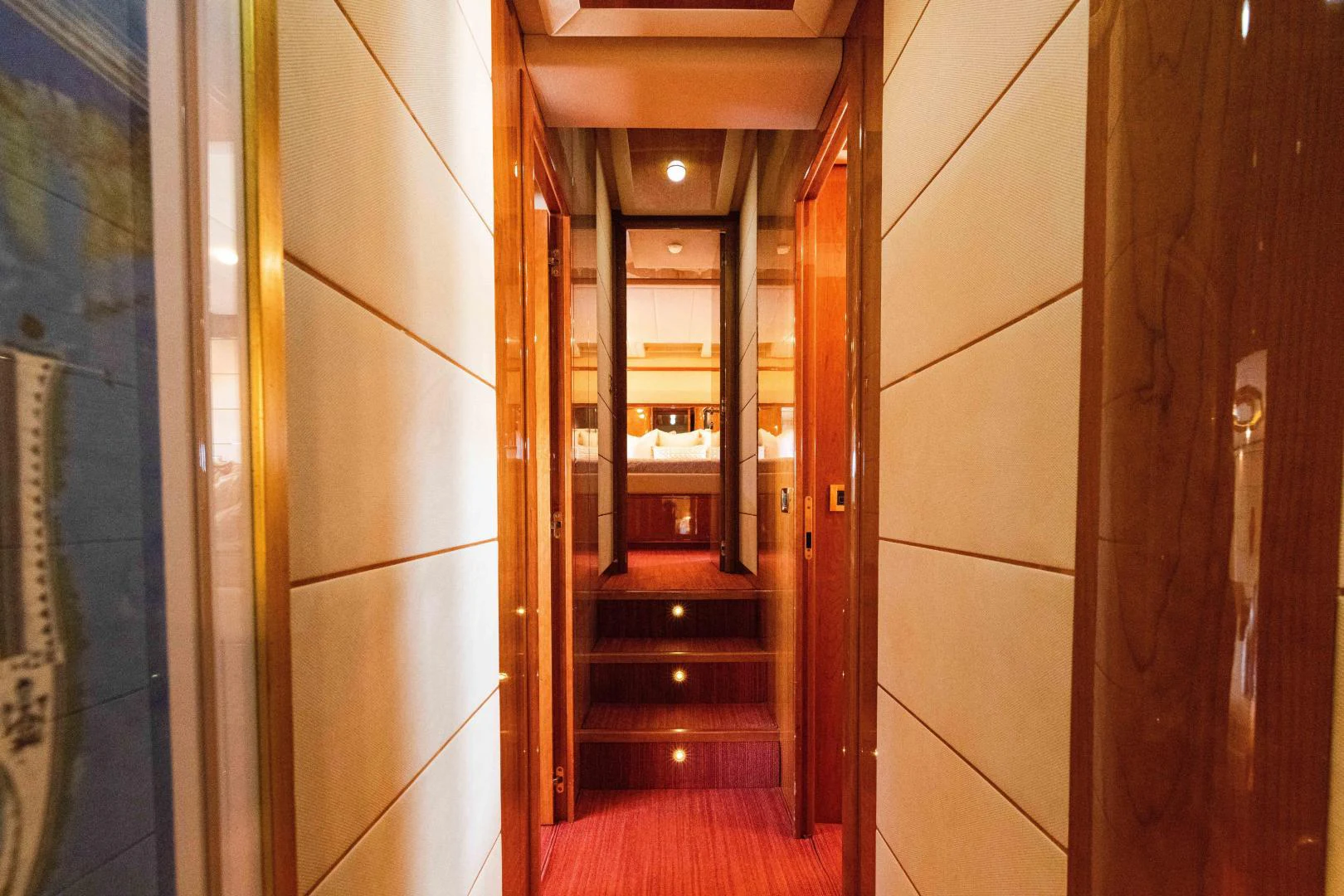 a hallway with doors aboard KAVITA Yacht for Sale