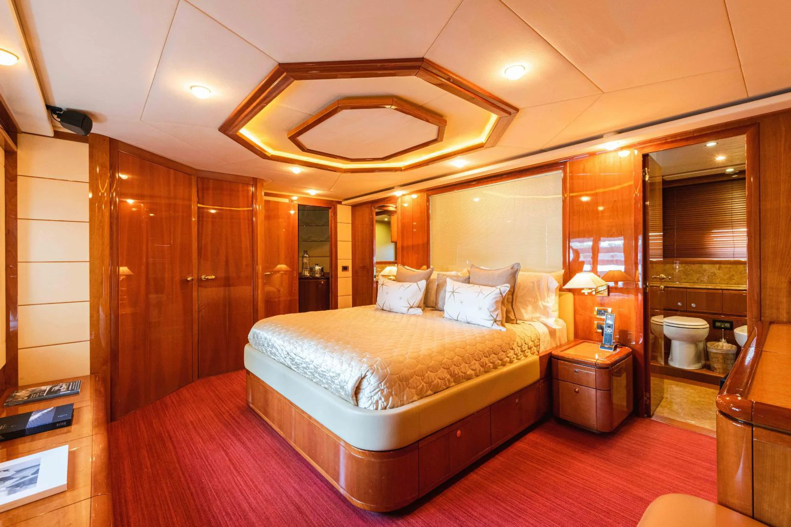 a large bedroom with a large bed aboard KAVITA Yacht for Sale