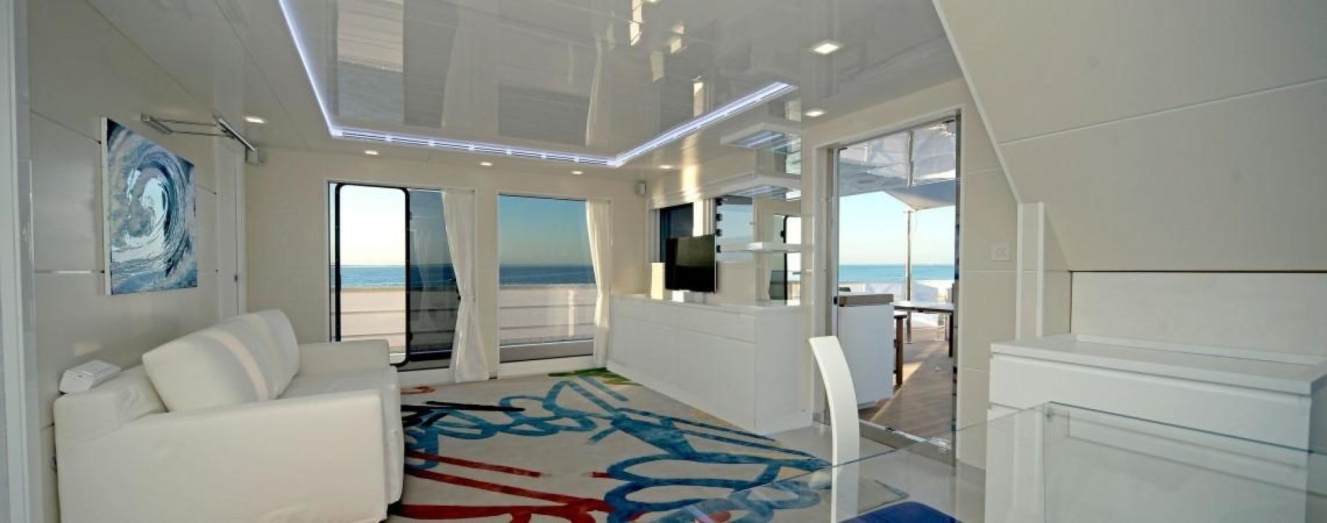 a room with a couch and a tv aboard NO NAME Yacht for Sale