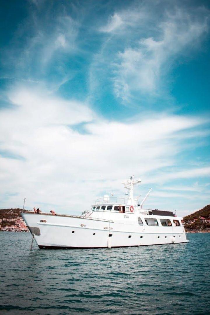 a white boat in the water aboard EVA Yacht for Sale