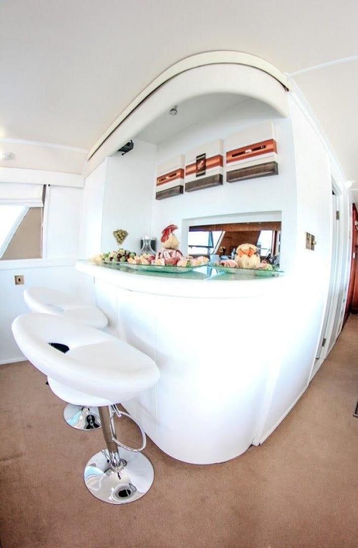 a bathroom with a large mirror aboard EVA Yacht for Sale