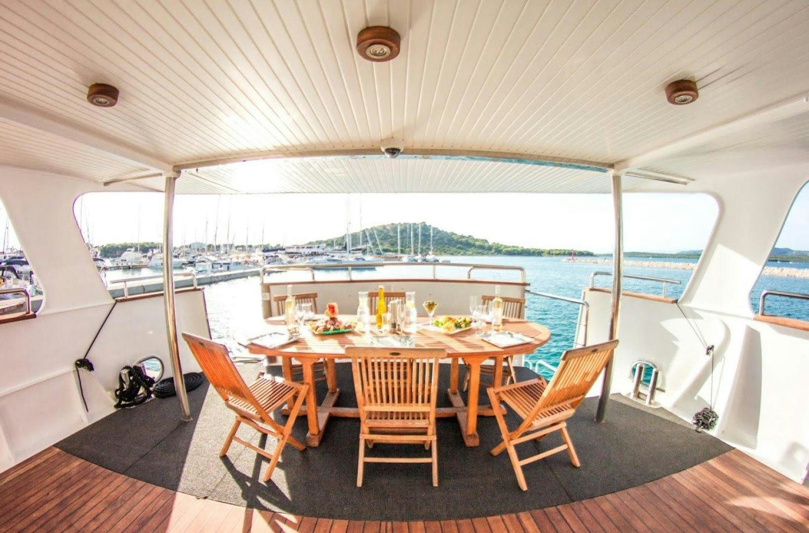 a dining table on a boat aboard EVA Yacht for Sale