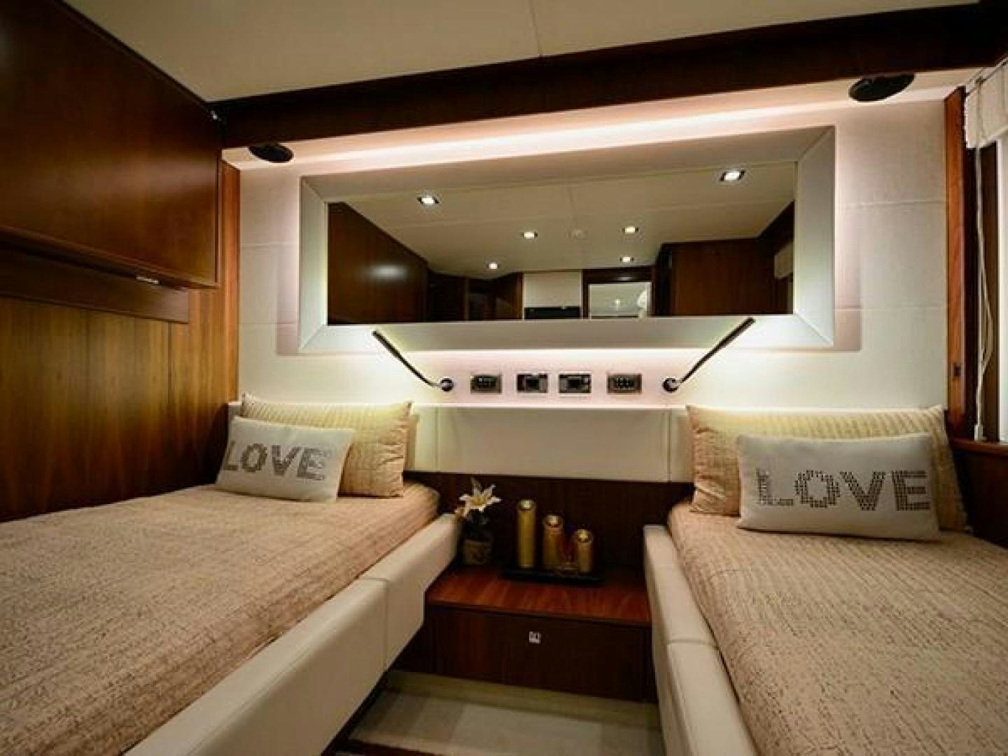 a room with two beds aboard EXIMIUS Yacht for Sale