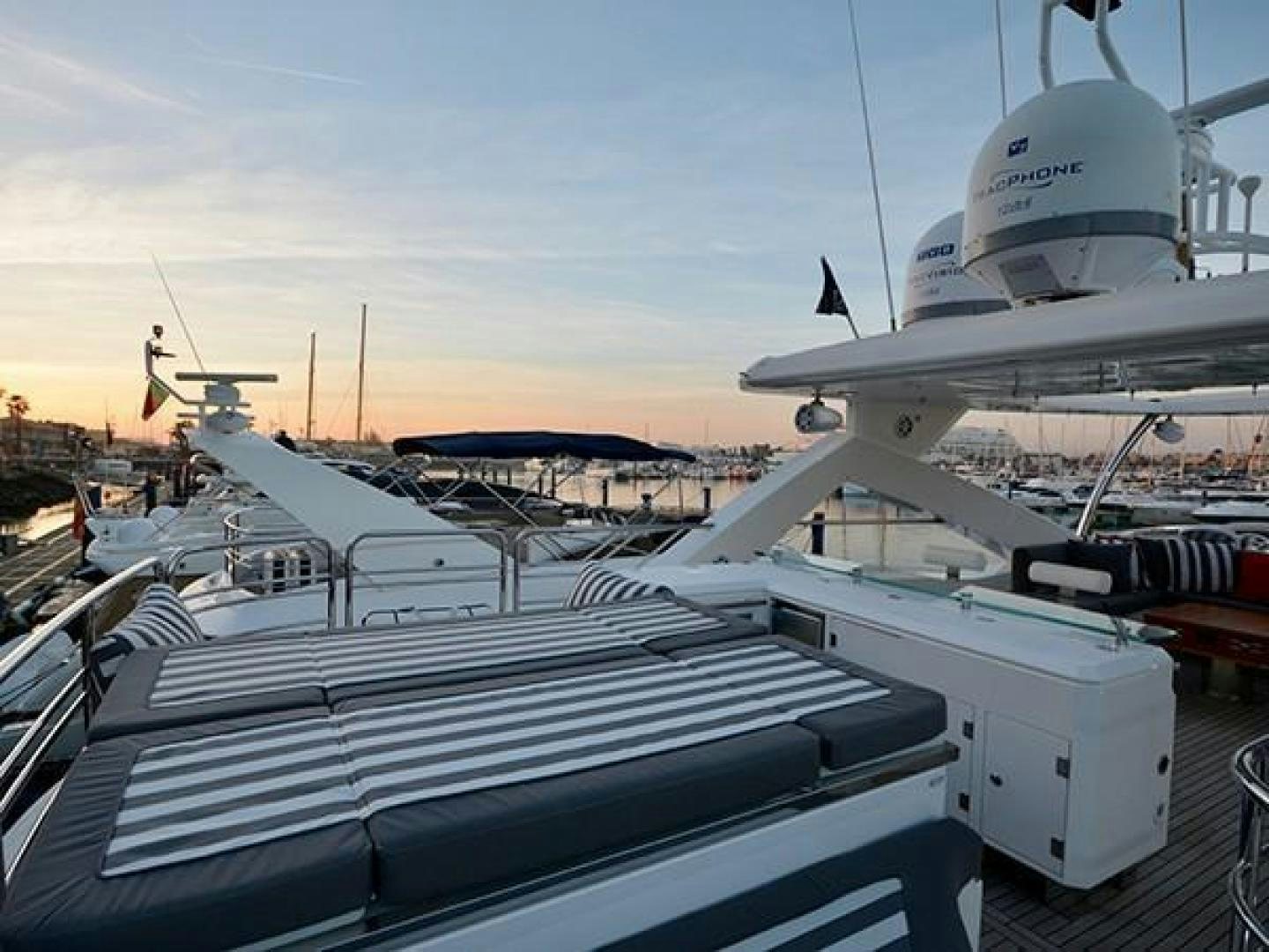 a row of boats on a dock aboard EXIMIUS Yacht for Sale