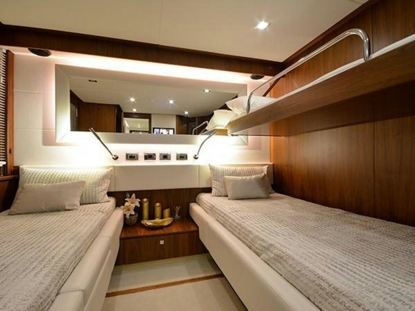 a room with two beds aboard EXIMIUS Yacht for Sale