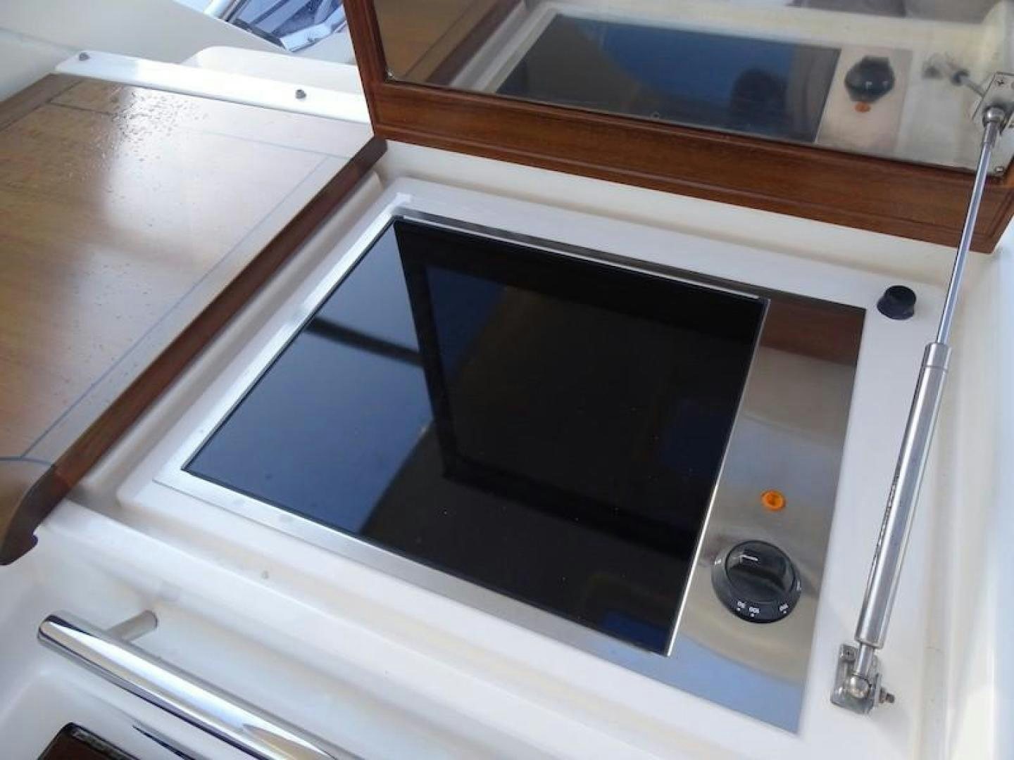 a white microwave oven aboard EXIMIUS Yacht for Sale