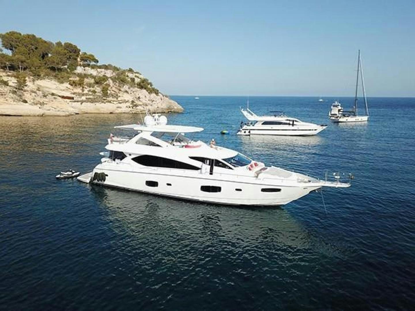 a couple of boats in the water aboard EXIMIUS Yacht for Sale