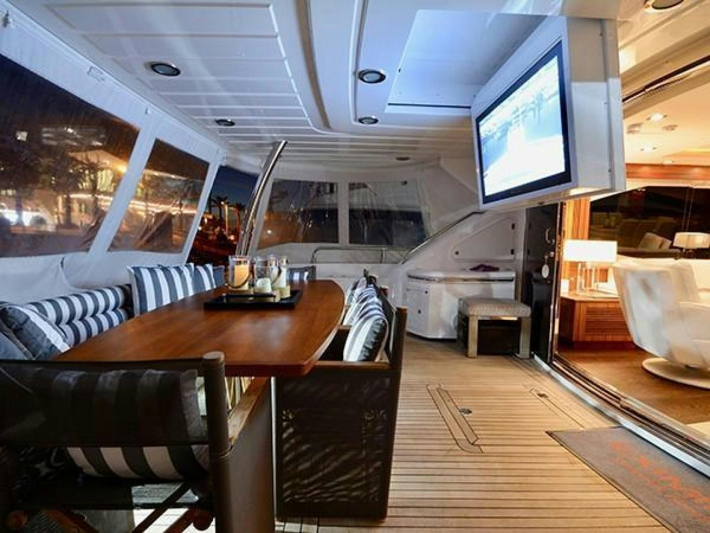 a room with a table and chairs aboard EXIMIUS Yacht for Sale