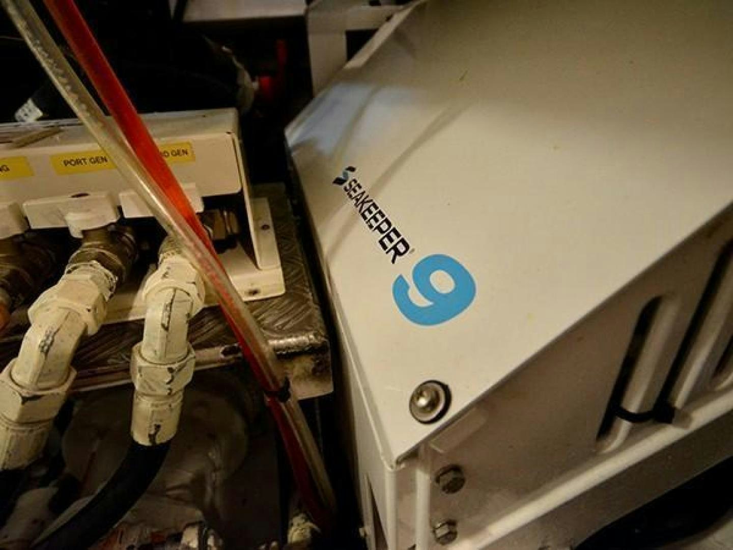 a machine with a piece of equipment aboard EXIMIUS Yacht for Sale