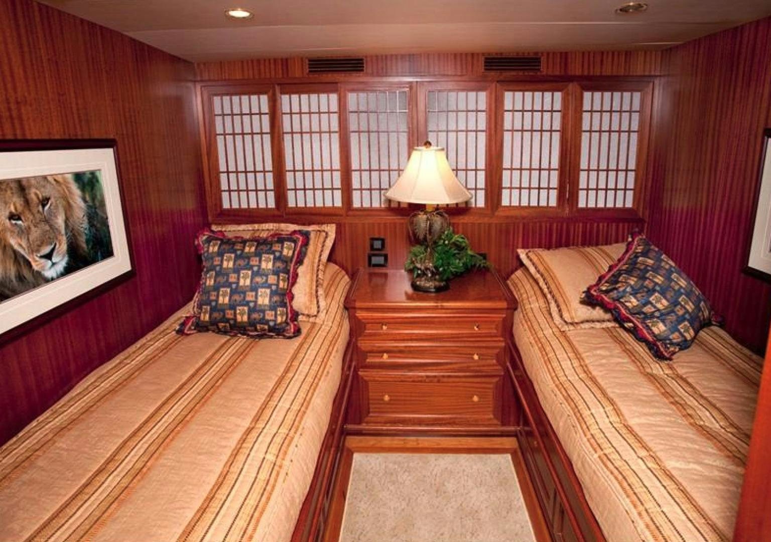 a room with a bed and a lamp on the table aboard NO NAME Yacht for Sale