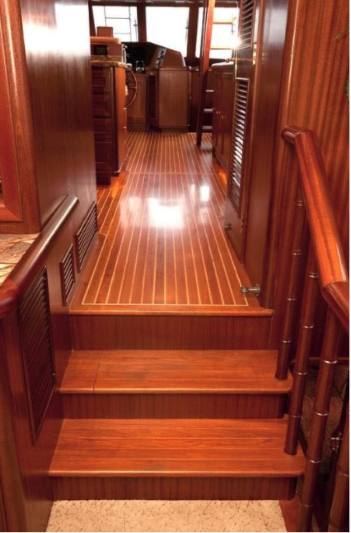 a wooden staircase in a house aboard NO NAME Yacht for Sale