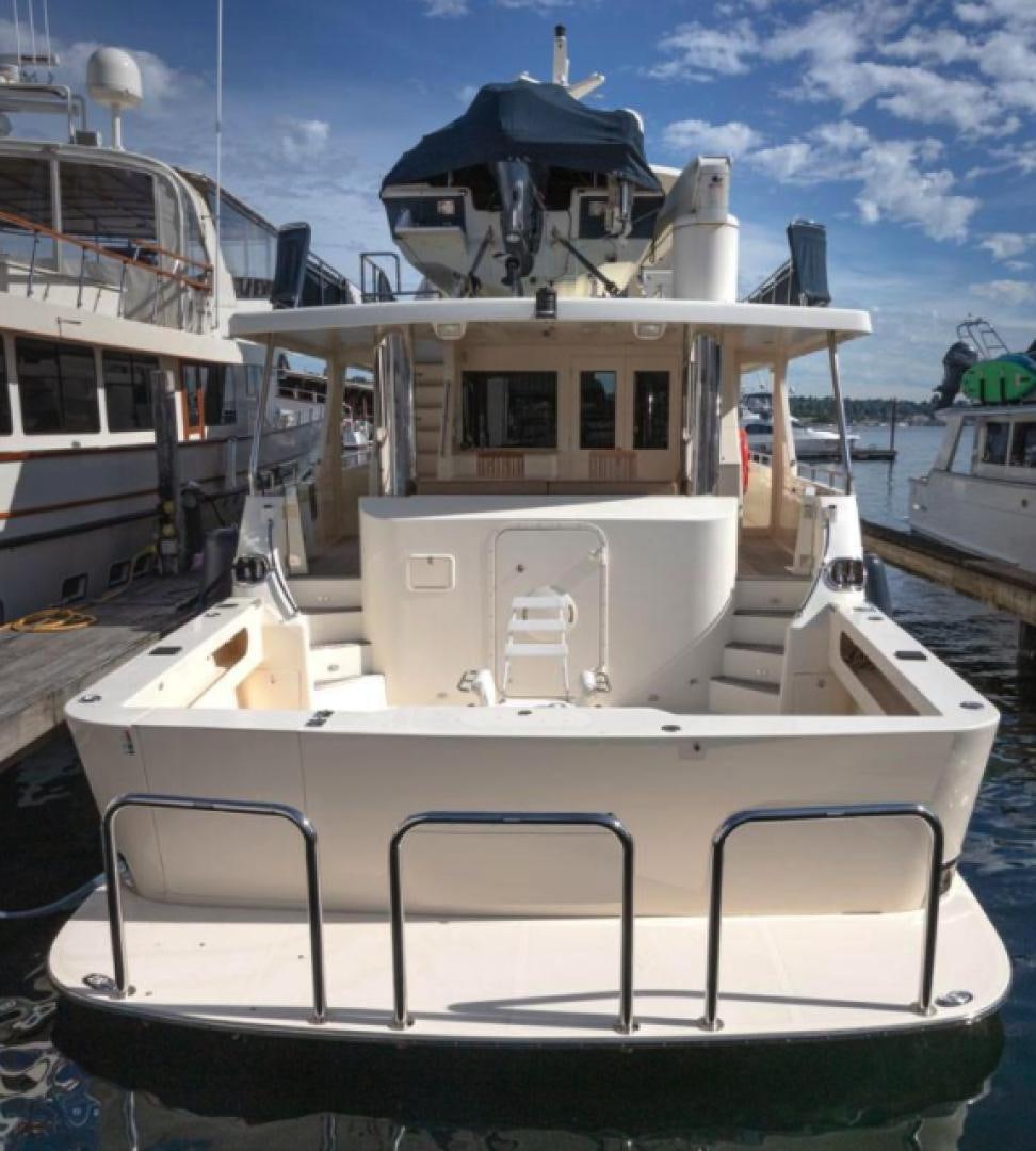 a boat docked at a pier aboard NO NAME Yacht for Sale