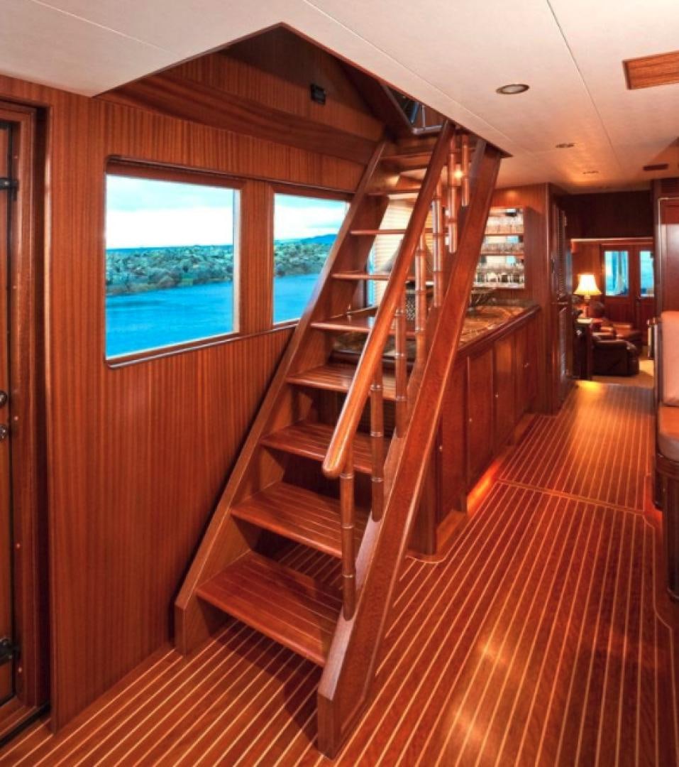 a wooden staircase in a house aboard NO NAME Yacht for Sale