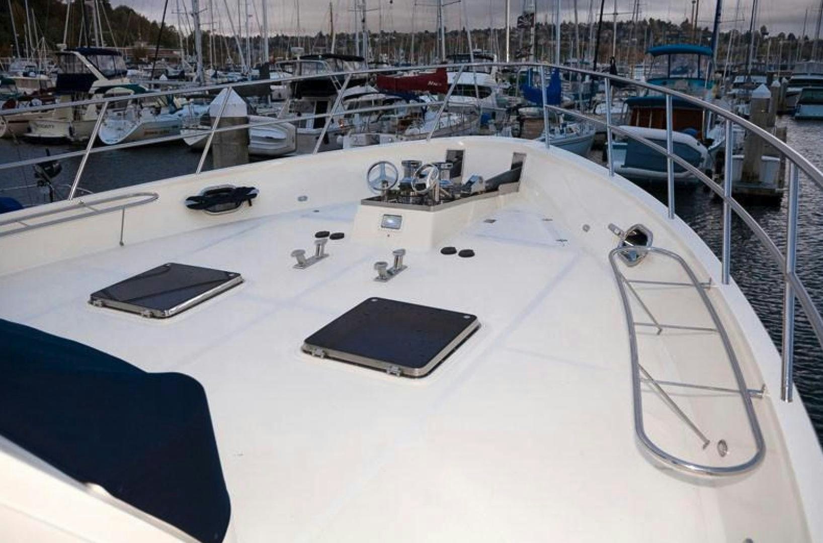 a white table with many boats aboard NO NAME Yacht for Sale