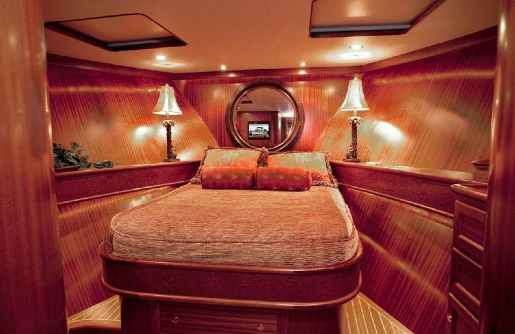 a bed with a round wooden frame aboard NO NAME Yacht for Sale