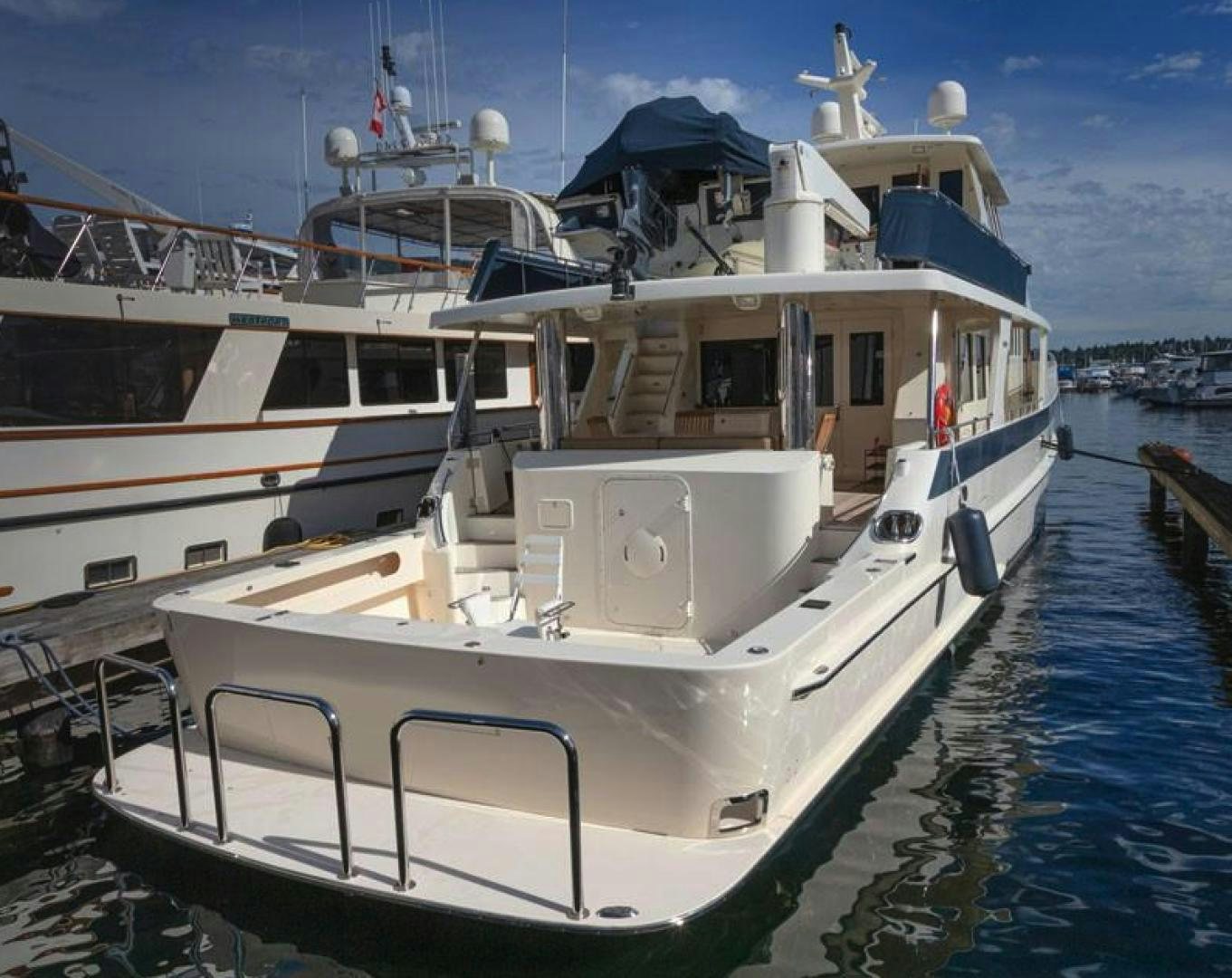 a boat docked at a pier aboard NO NAME Yacht for Sale