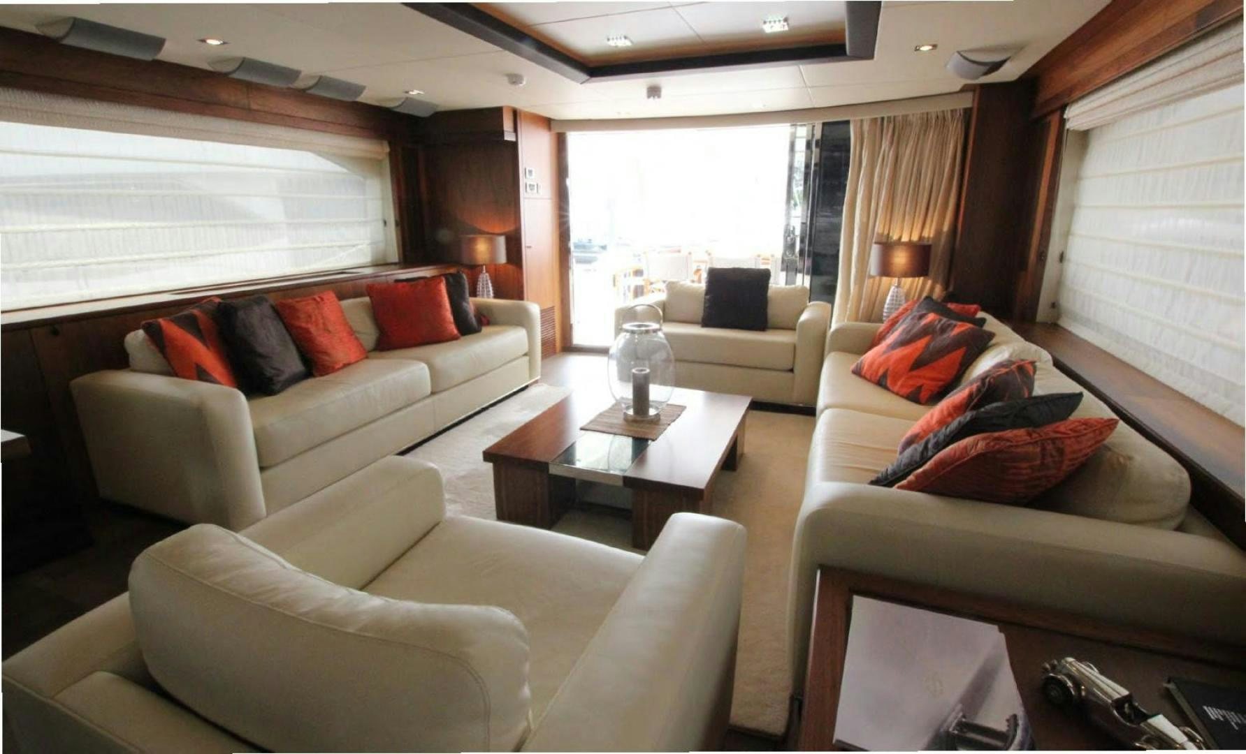 a living room with a couch and a coffee table aboard ANNABEL Yacht for Sale