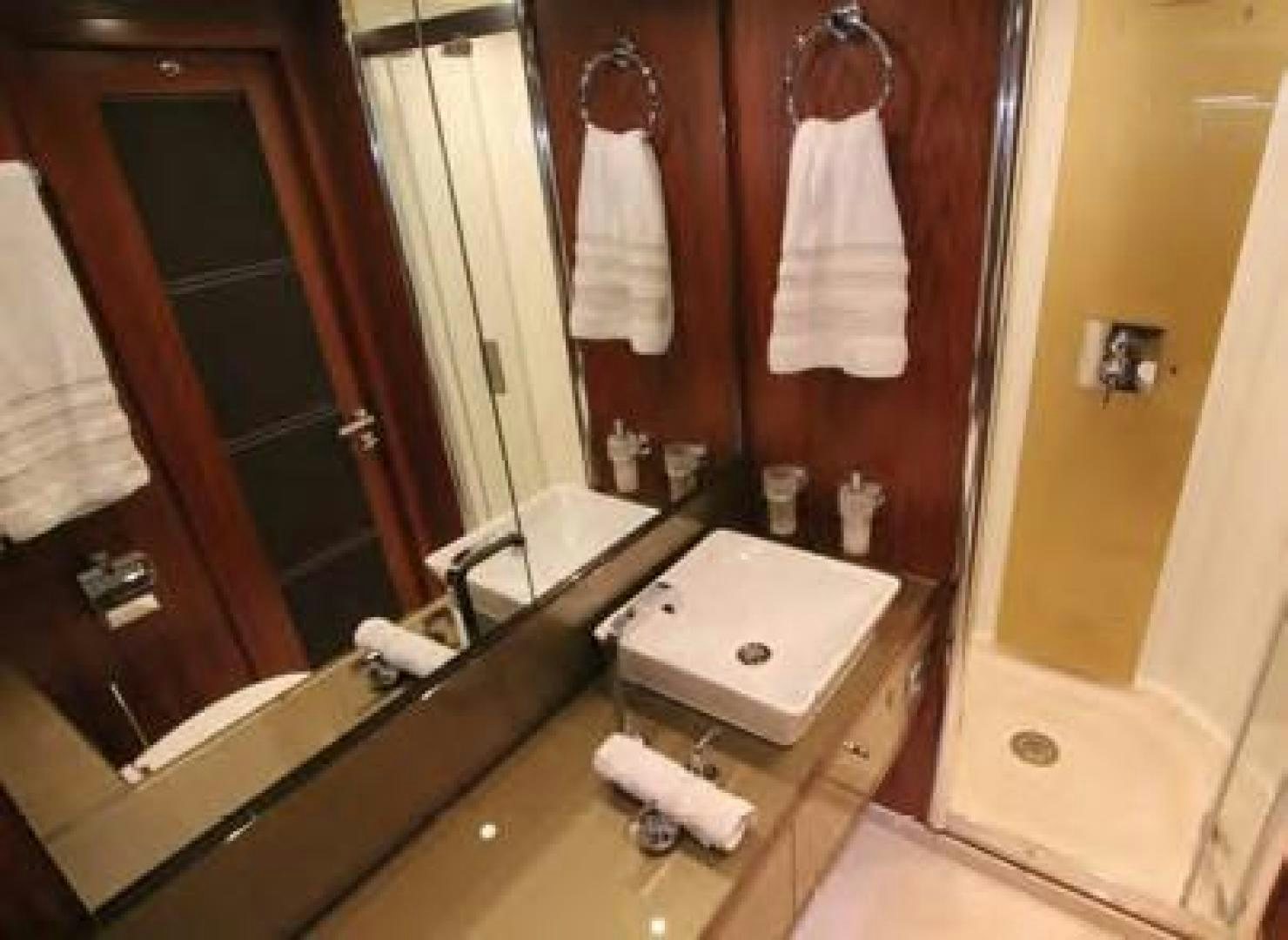 a bathroom with a large mirror aboard ANNABEL Yacht for Sale