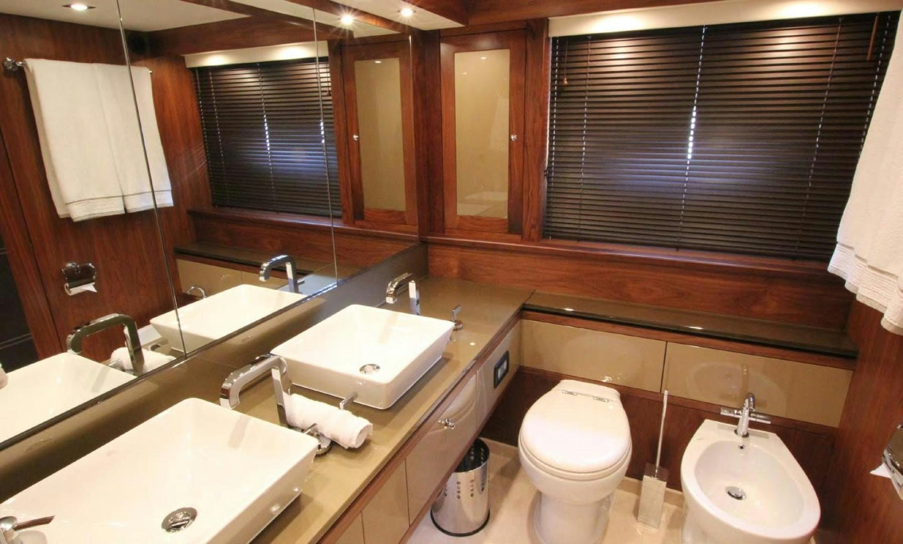 a bathroom with a sink toilet and a bathtub aboard ANNABEL Yacht for Sale