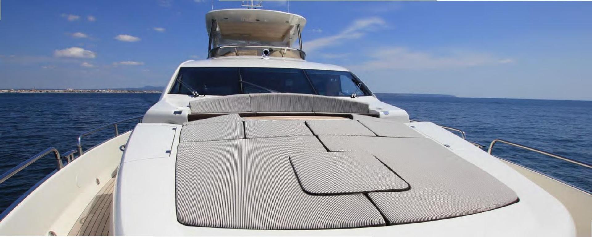 a white boat on a body of water aboard ANNABEL Yacht for Sale