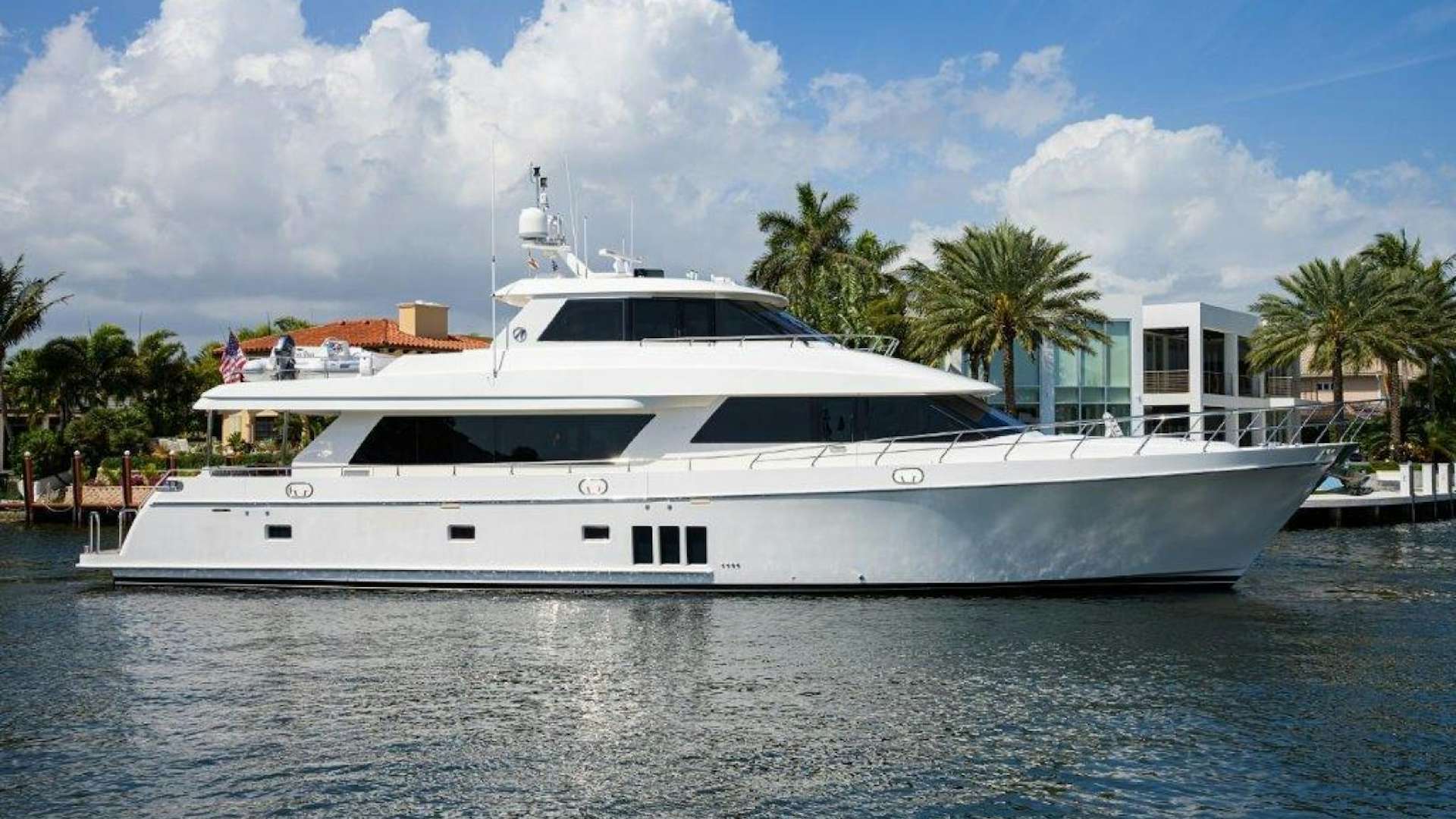 a white yacht in the water aboard AMAZING GRACE Yacht for Sale