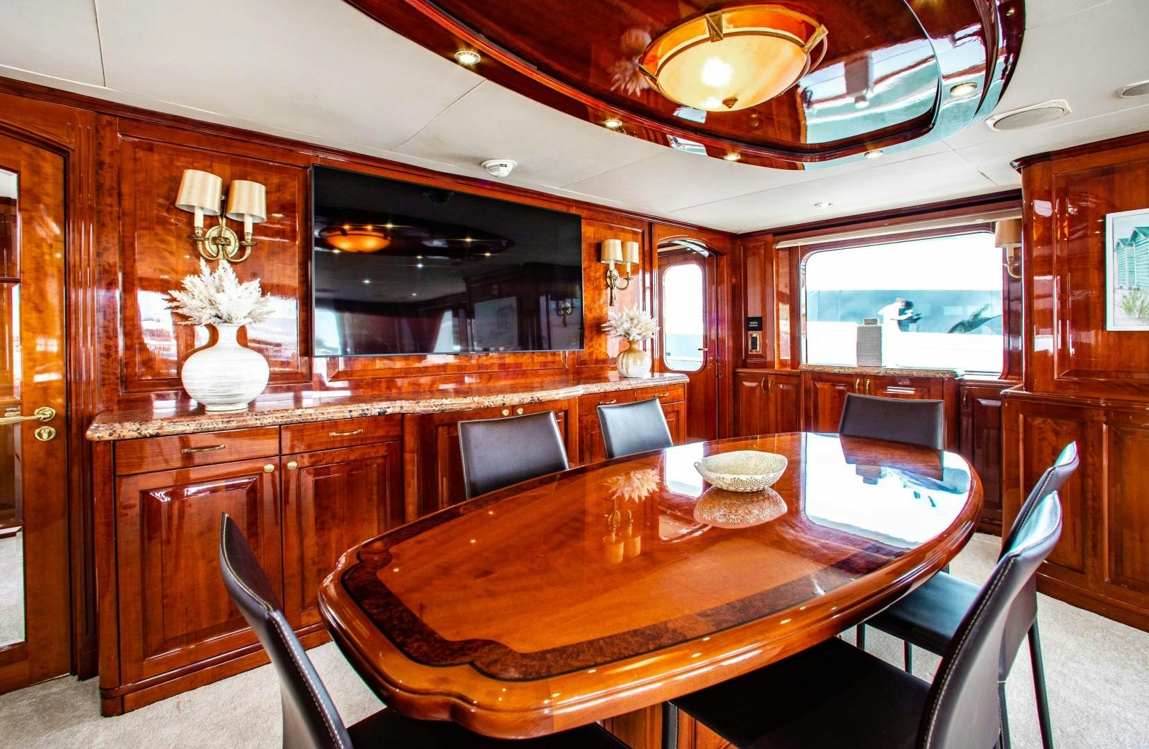 a dining table in a cabin aboard DRIVEN Yacht for Sale