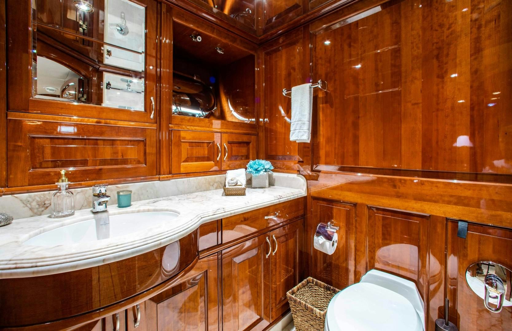 a bathroom with wooden walls aboard DRIVEN Yacht for Sale