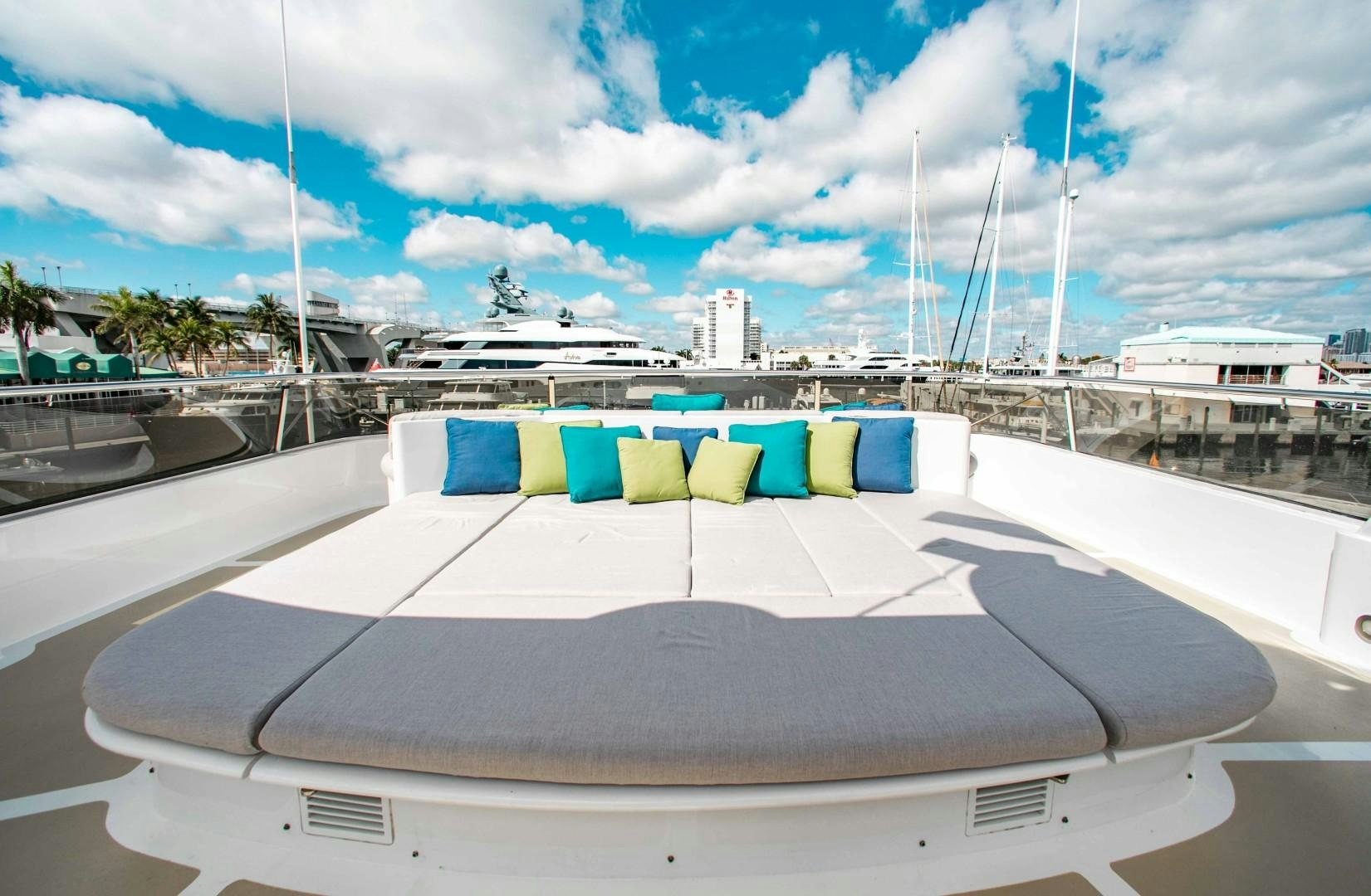 a white yacht on a sunny day aboard DRIVEN Yacht for Sale