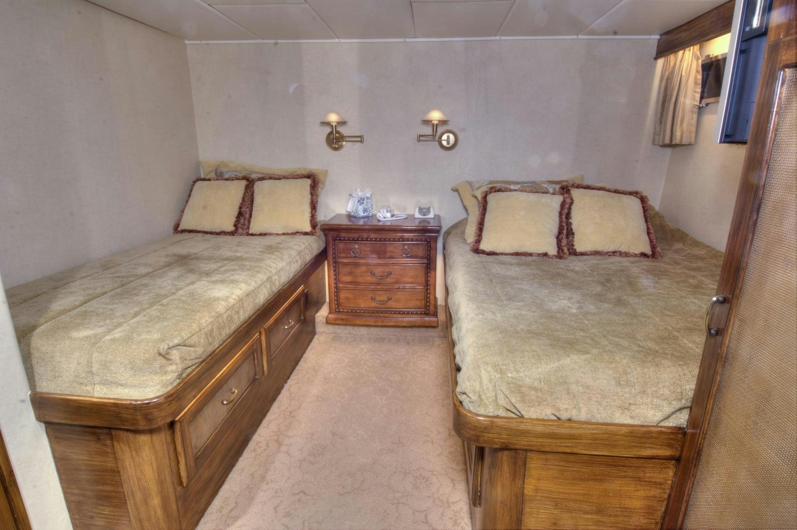 a couple of beds in a hotel room aboard WHISKEY DAWN Yacht for Sale