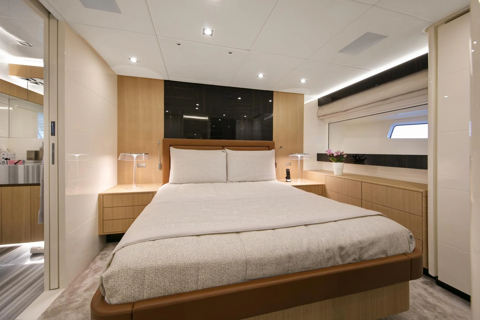 a large bed in a room aboard URSUS V Yacht for Sale