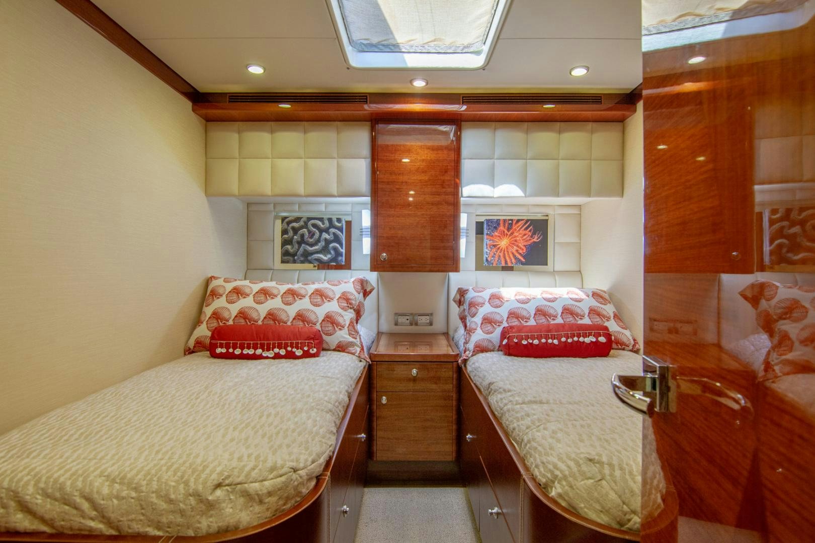 a couple of beds in a room aboard BRAVO Yacht for Sale