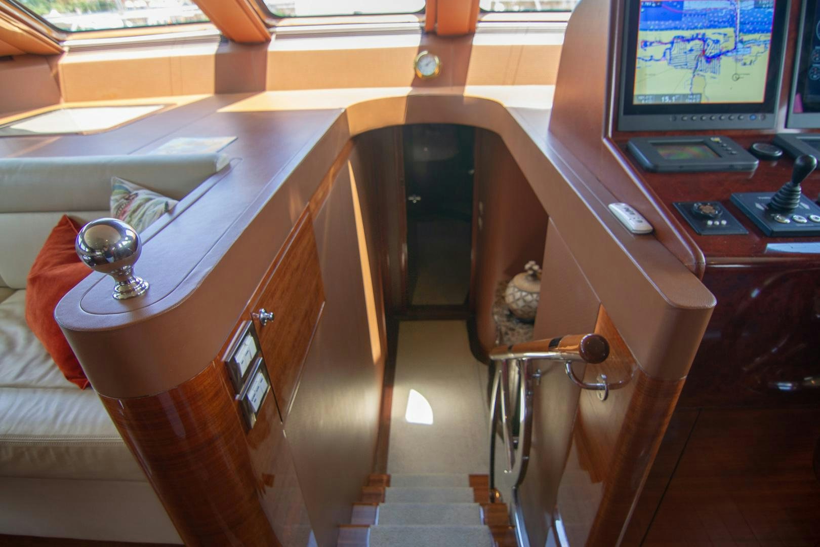 a desk with a computer and a chair aboard BRAVO Yacht for Sale