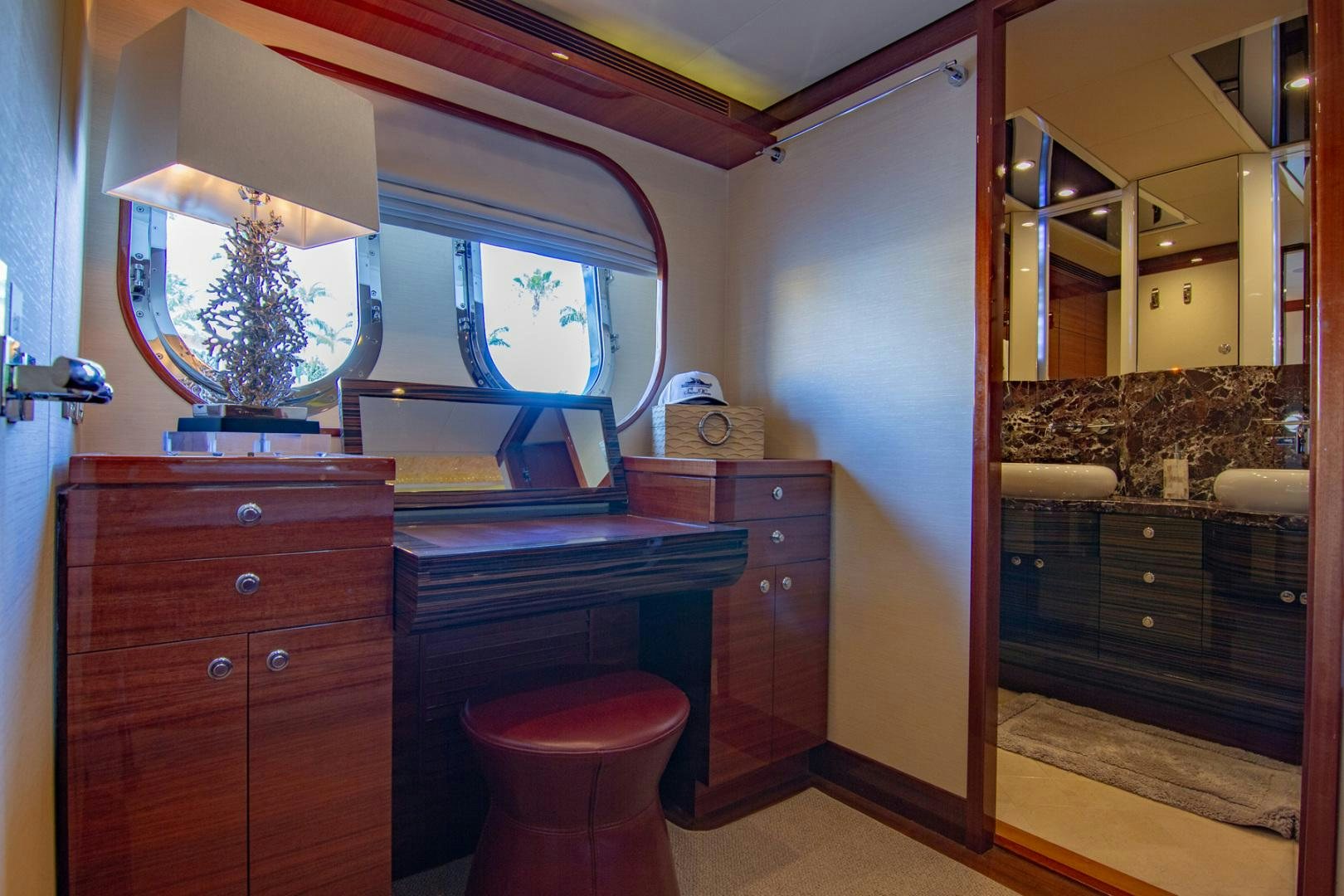 a bathroom with a large mirror aboard BRAVO Yacht for Sale