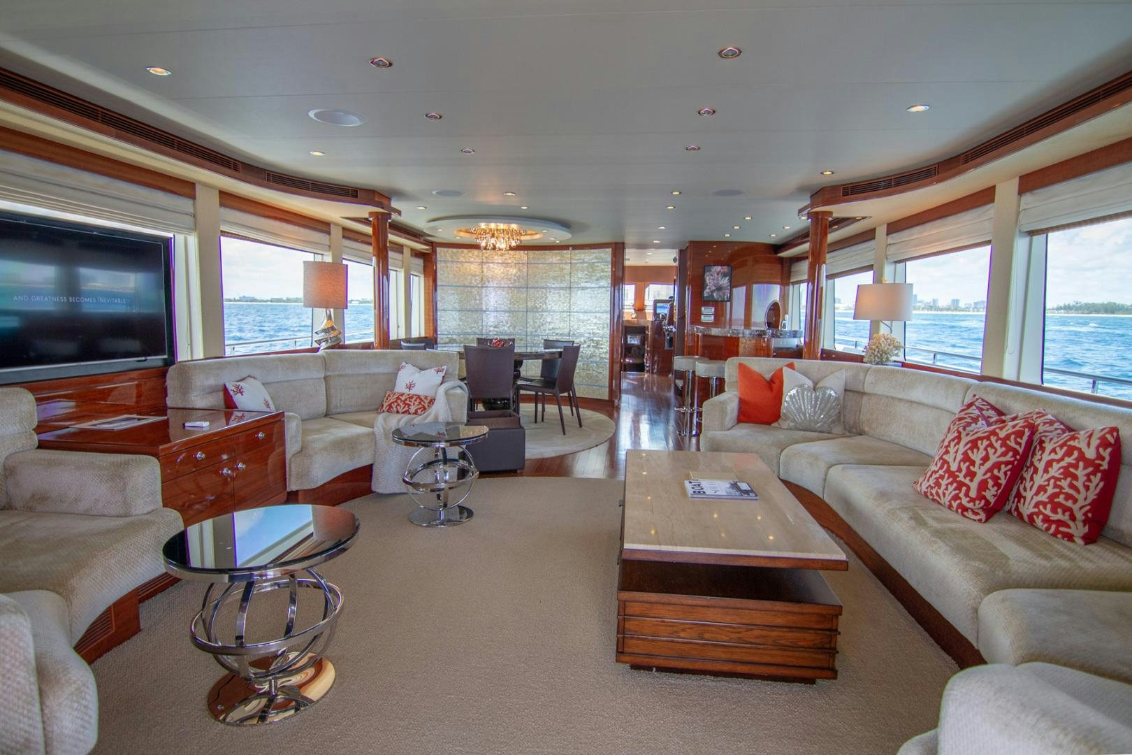 a living room with a large window aboard BRAVO Yacht for Sale