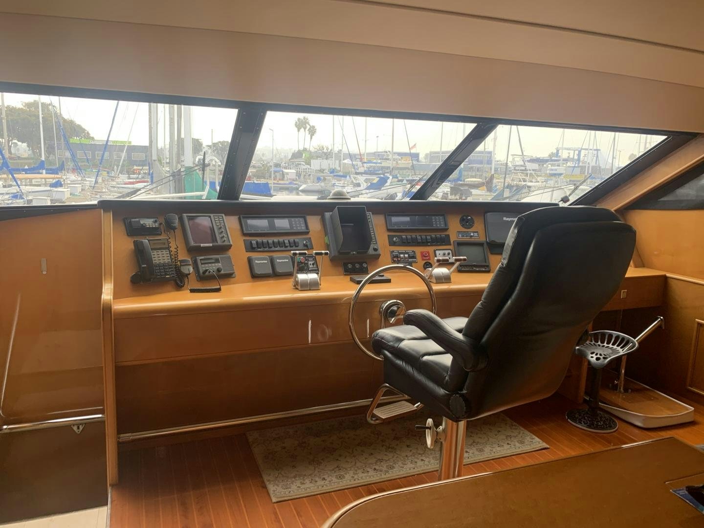 a chair in front of a desk aboard REHAB Yacht for Sale