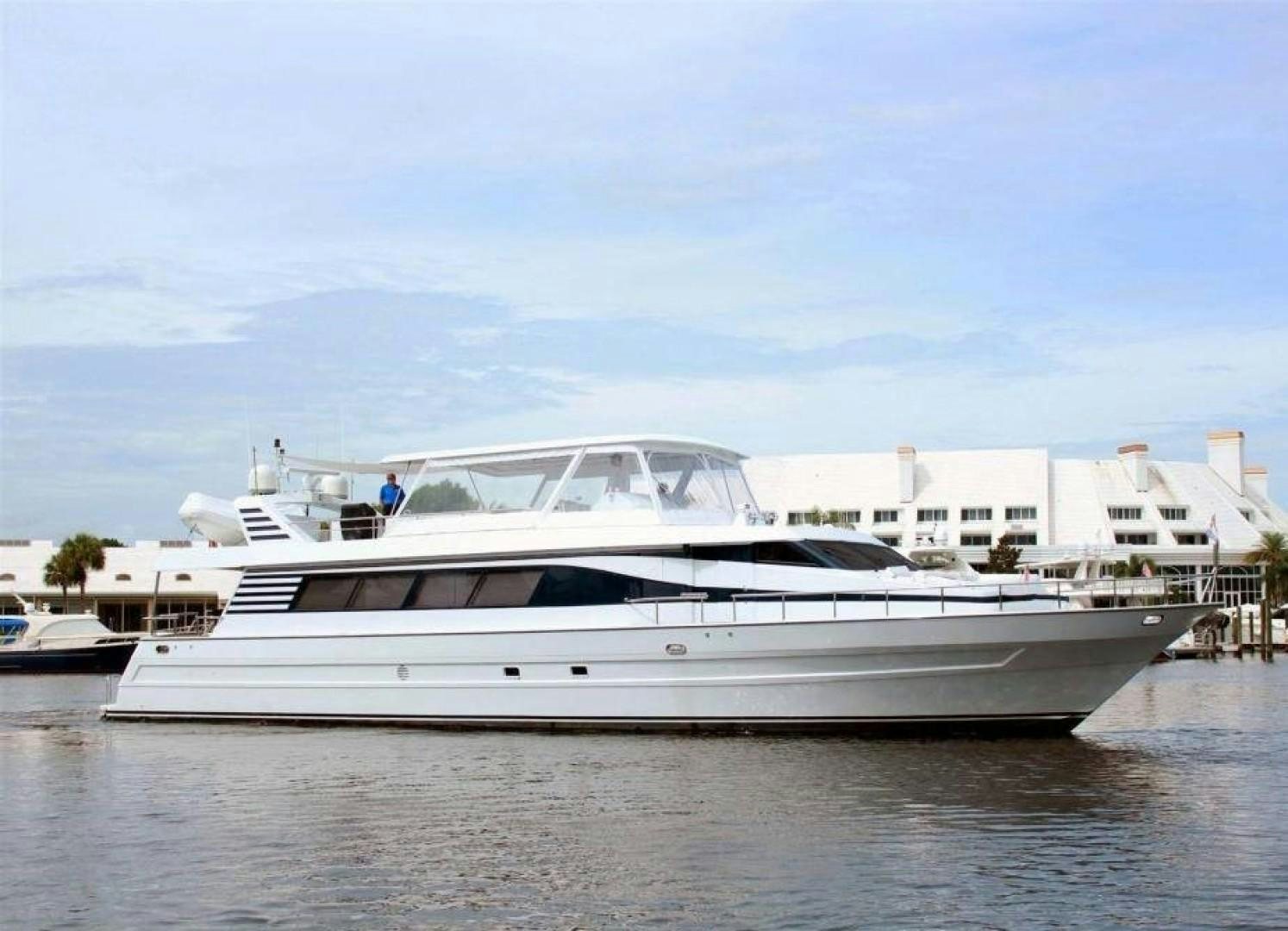 a white yacht in the water aboard REHAB Yacht for Sale