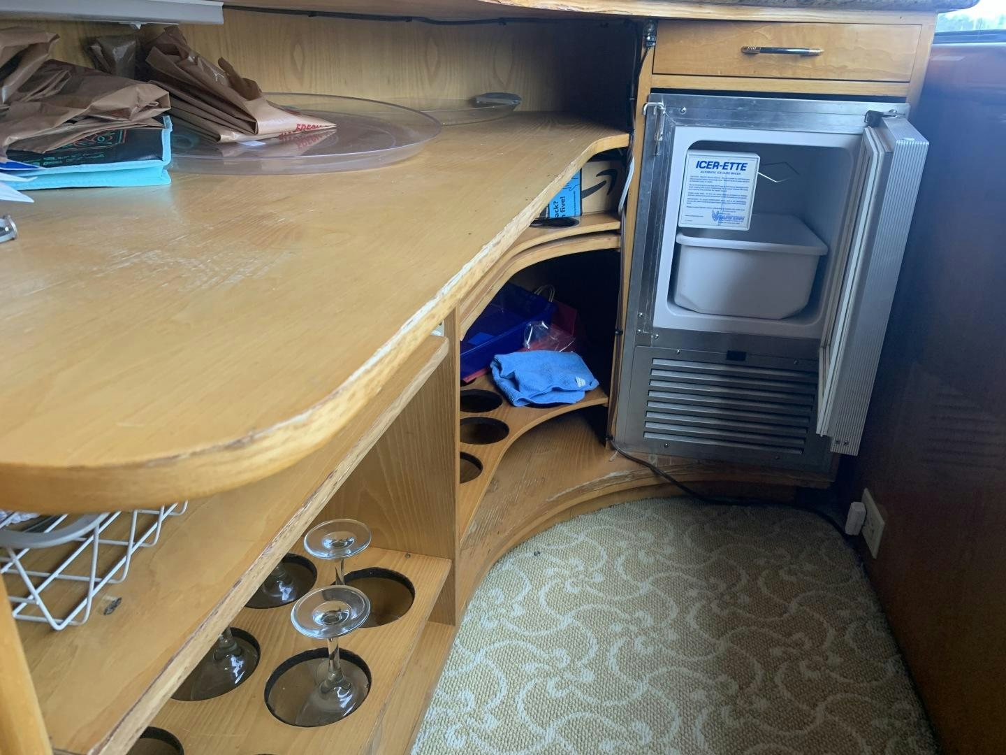 a microwave oven on a table aboard REHAB Yacht for Sale