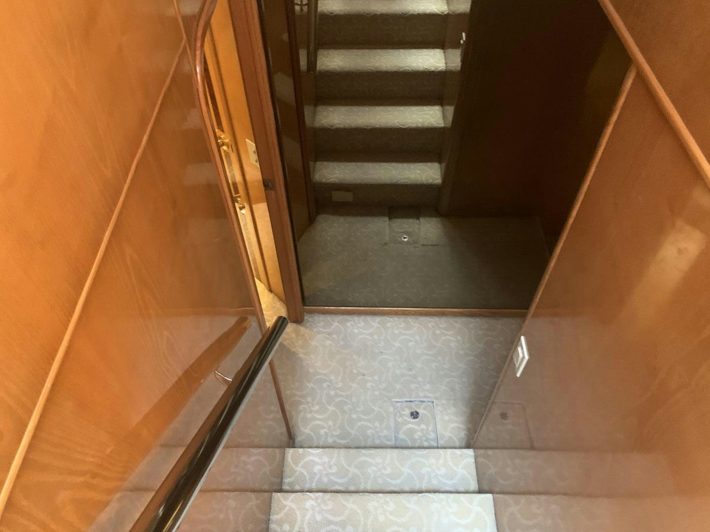 a set of stairs in a room aboard REHAB Yacht for Sale