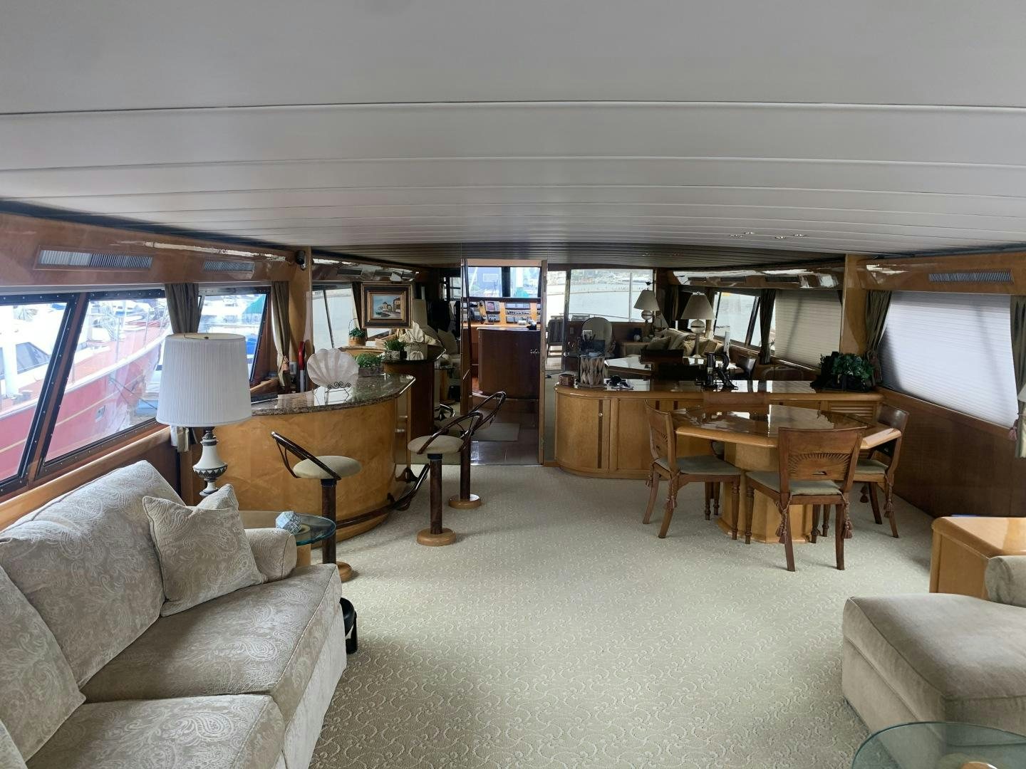 a living room with a couch and a table aboard REHAB Yacht for Sale