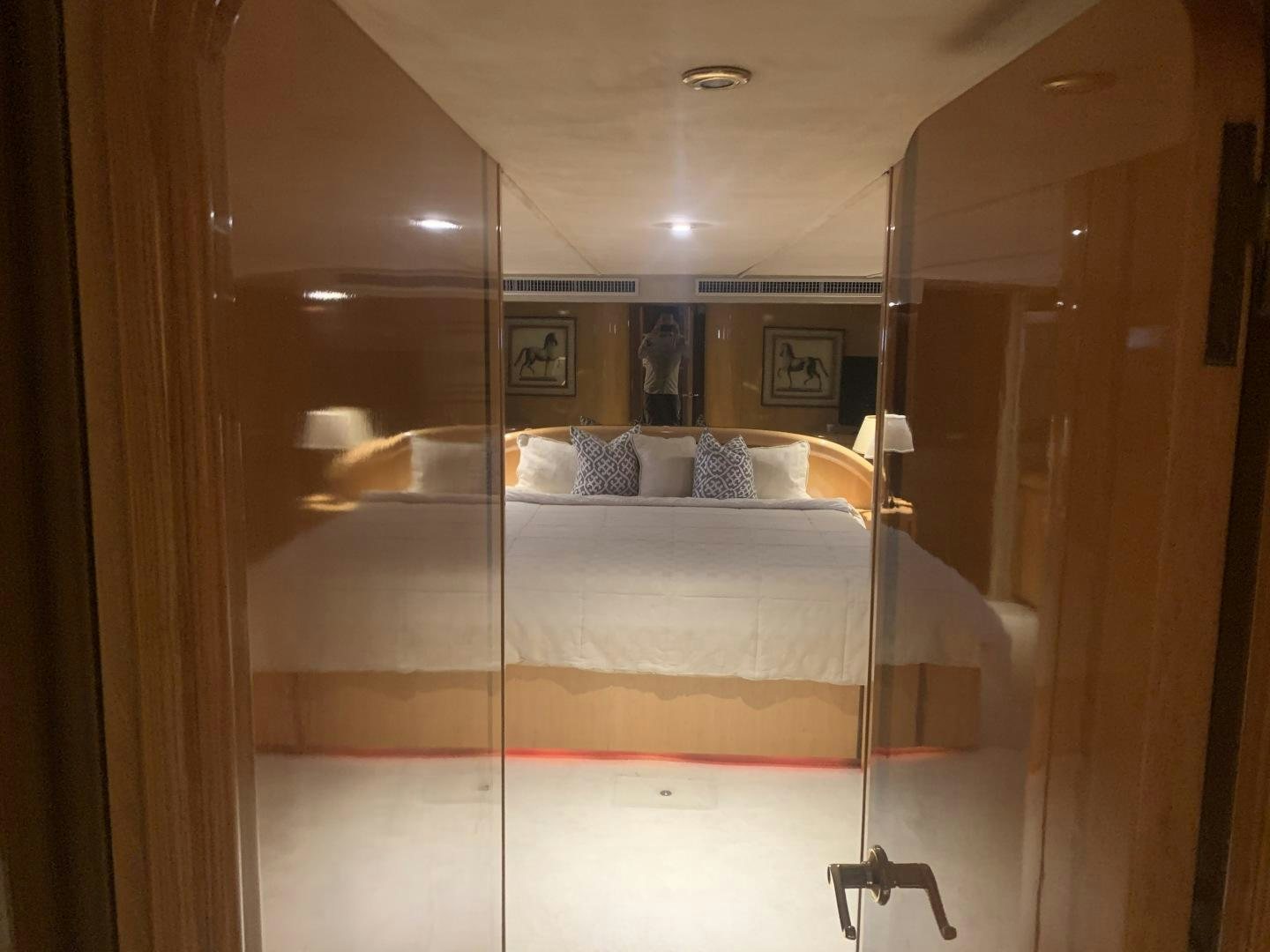 a bed in a room aboard REHAB Yacht for Sale