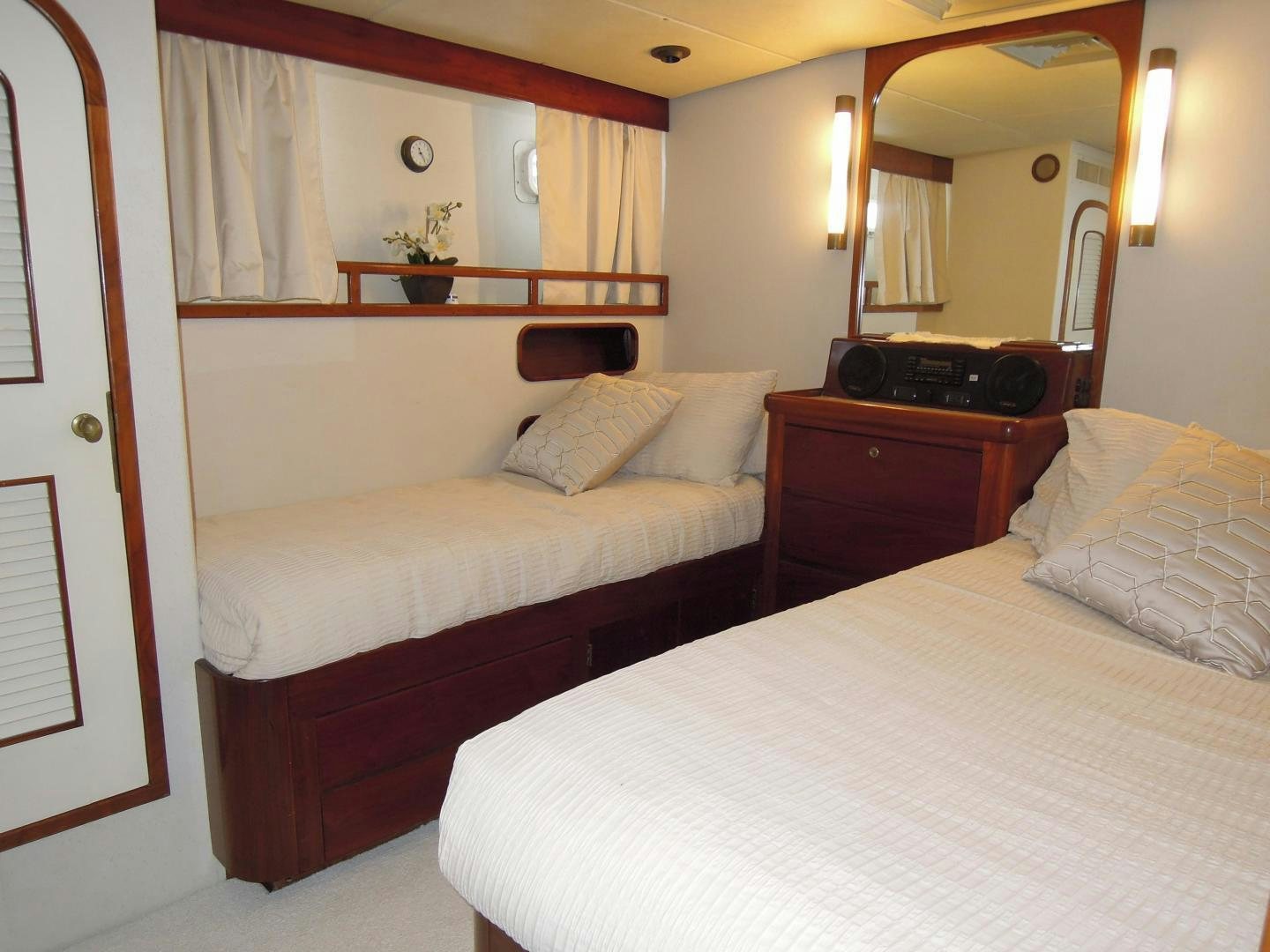 a room with two beds aboard SEA ANGEL Yacht for Sale